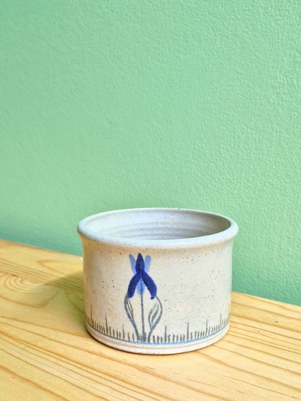 Handcrafted Ceramic Cup with Blue Floral Iris Detail